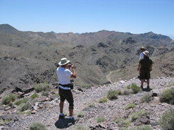 End of harrowing road past saddle